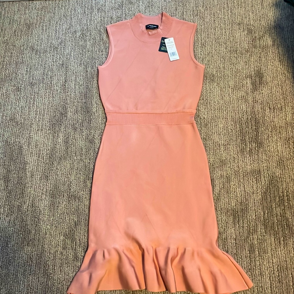 Never been worn rose gold dress by Bebe with tags